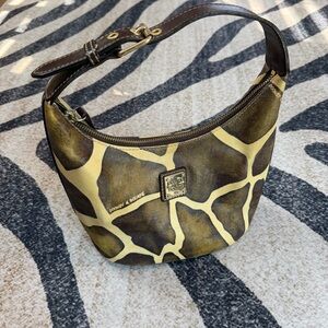 Vintage Authentic Dooney & Bourke shoulder bag. Hobo style, giraffe/cow EUC